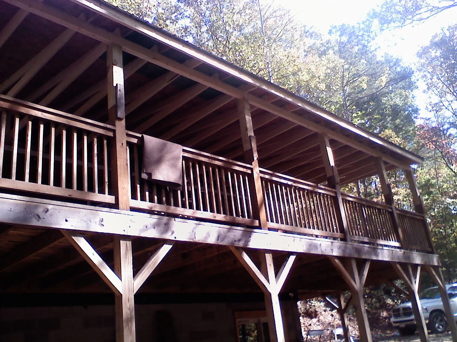 Timber framing under a new elevated porch and deck — Roof Leak Repair in Rockfield by Roofing Brothers